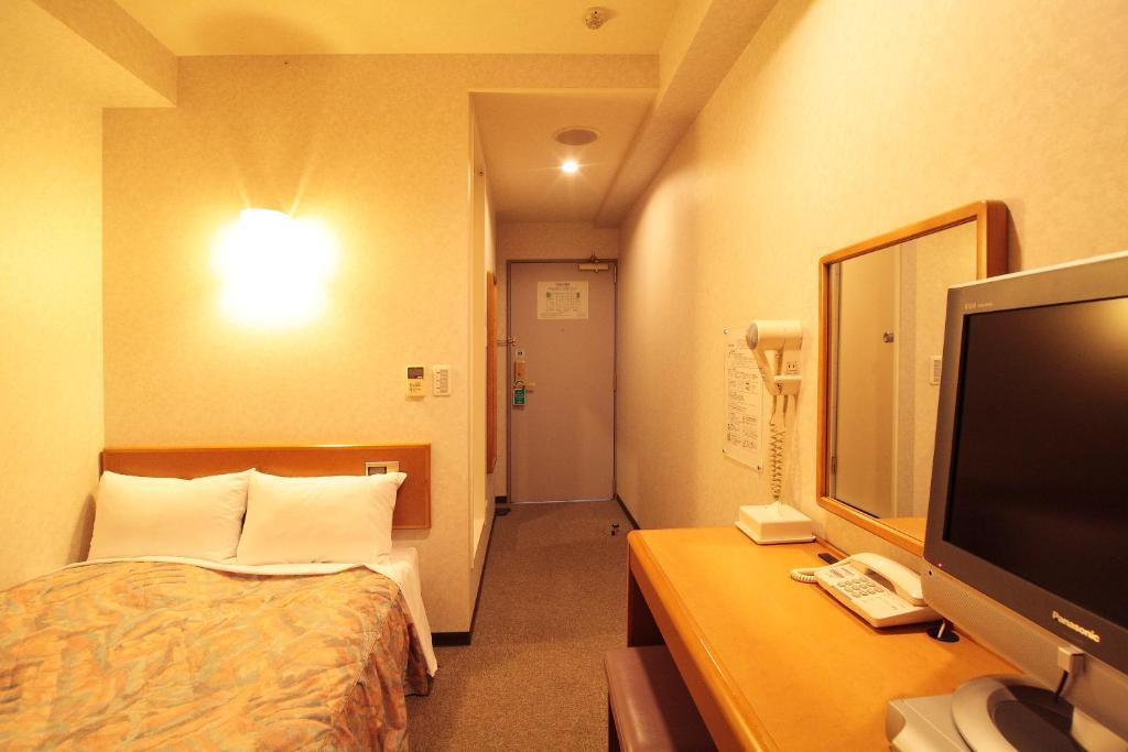 Hotel New Budget Sapporo Rum bild